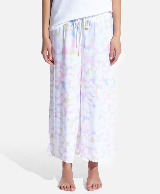 Pantaloni con stampa floreale a margherite. Prezzo 9,99 €